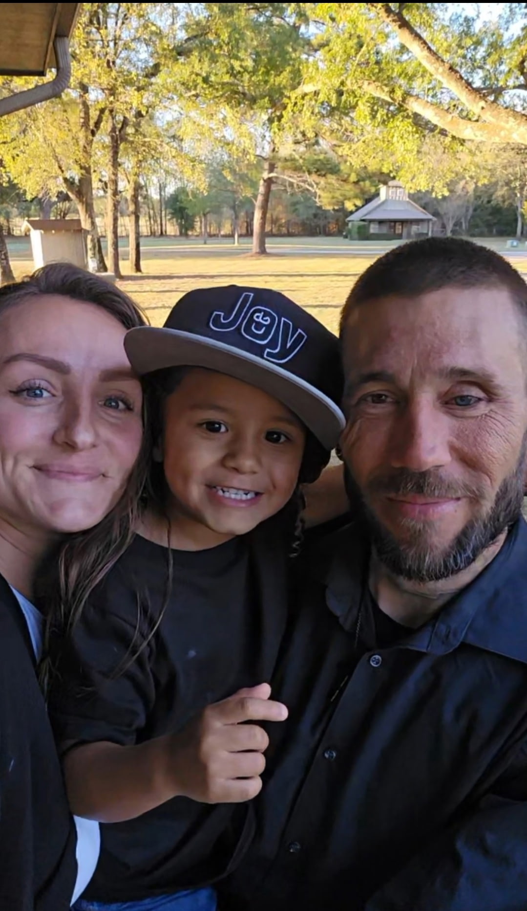 Doug, Ka’lun, and Kaisaiah together outdoors